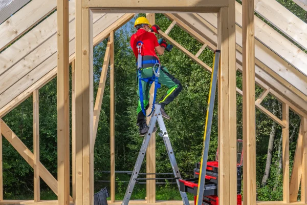construction-site-worker-building-wooden-house-fra-2025-03-14-02-41-33-utc_2_11zon